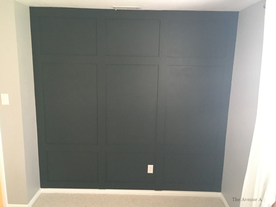 Dark Green Accent Wall Wainscoting Black Evergreen By Behr and the paint is Glidden Diamond Eggshell -The Avenue A